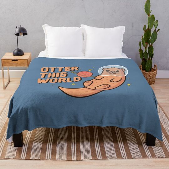 Discover Astronaut Otter Throw Blanket