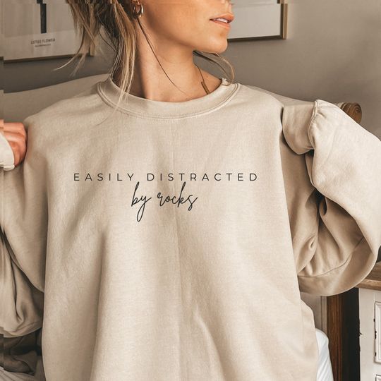 Discover Easily Distracted By Rocks Sweatshirt