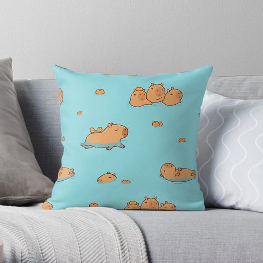 Discover Capybara hot spring pattern swimming with oranges Throw Pillow