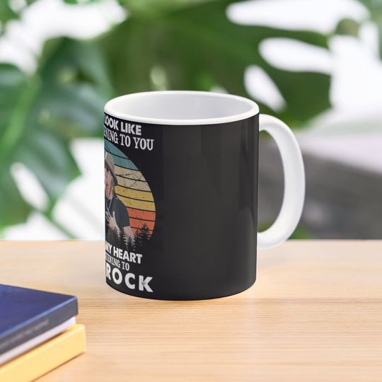 Discover I Might Look Like I'm Listening To Kid Legend Rock Coffee Mug