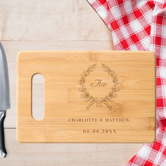 Discover Monogram wreath couple wedding cutting board