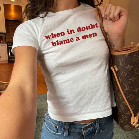 Discover When In Doubt Blame A Man Graphic Baby Tee, Iconic Slogan Baby Tee