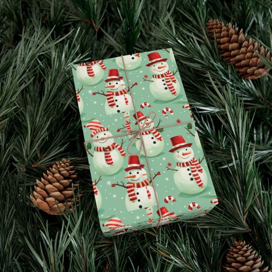 Discover Festive Snowman Wrapping Paper, Candy Cane Design, Perfect for Holiday Gift Giving