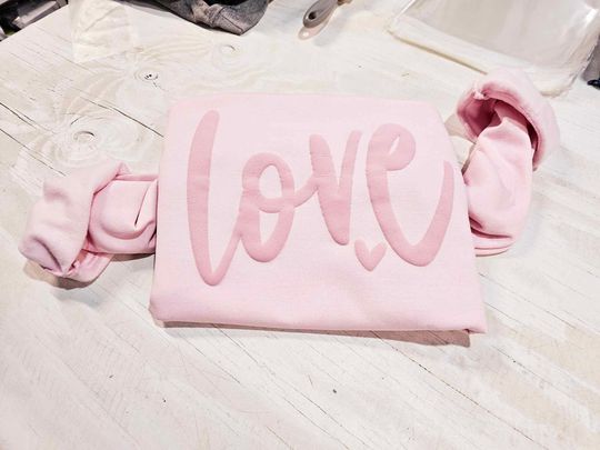 Discover Pink Love Embossed Sweatshirt
