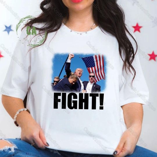 Discover Trump Assassination Graphic T-shirt - Supportive Style