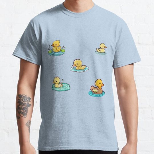 Discover Mix of tender ducklings swimming