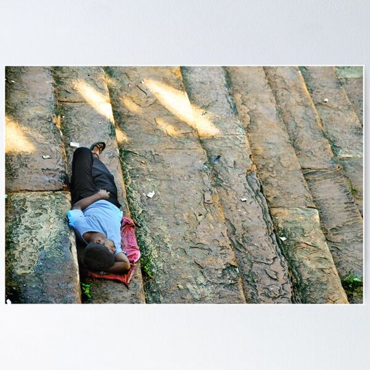 Discover Man sleeping on stairs