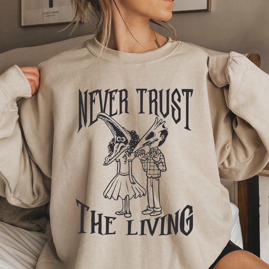 Discover Never Trust The Living sweatshirt, Beetlejuice shirt