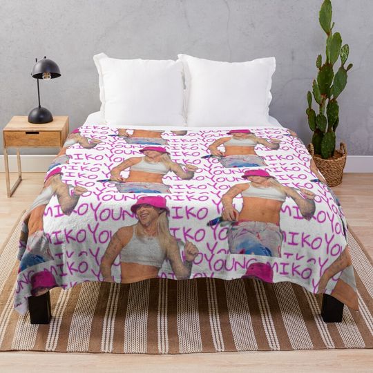 Discover Young Miko Throw Blanket
