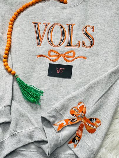 Discover Embroidered side bow sweatshirt , Custom football College football