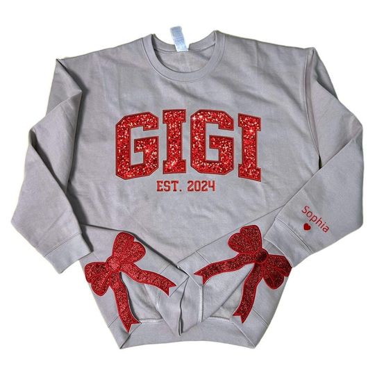 Discover Glitter Gigi Est Claus Embroidered Mimi, Grandma Christmas Bow Embellished Sweatshirt  Custom Side Bow Cut-Out Sweatshirt