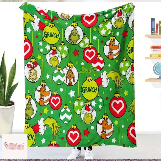 Discover Grin.ch funny character Christmas Blanket