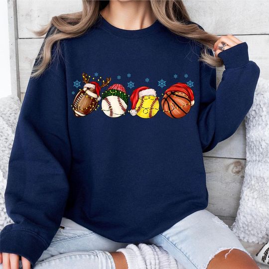 Discover Sport Balls Christmas Lights Sweatshirt, Football Baseball Basketball Christmas Hat Sweatshirt
