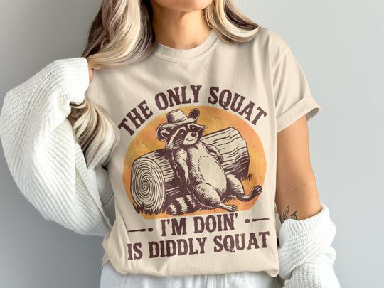 Discover Funny Raccoon T-Shirt, The Only Squat Is Diddly Squat Shirt, Lazy Animal Graphic