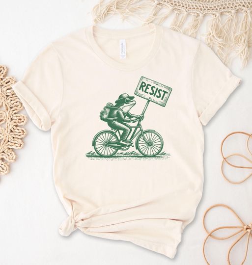 Discover Frog on Bicycle Resist t shirt, National Parks, frog and toad, resistance resist, frog