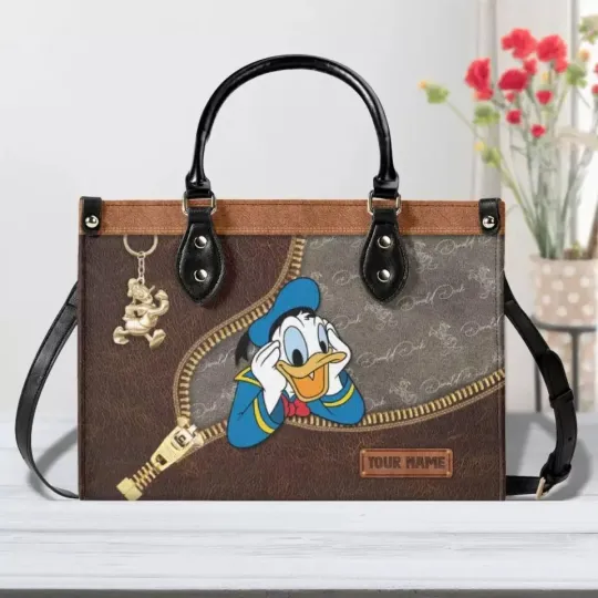 Discover Custom name Donald Duckk Vintage Leather Handbag