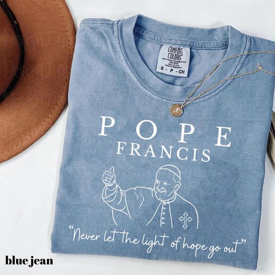 Discover Comfort ColorsNever Let The Light of Hope Go Out Shirt, Pope Francis T-Shirt