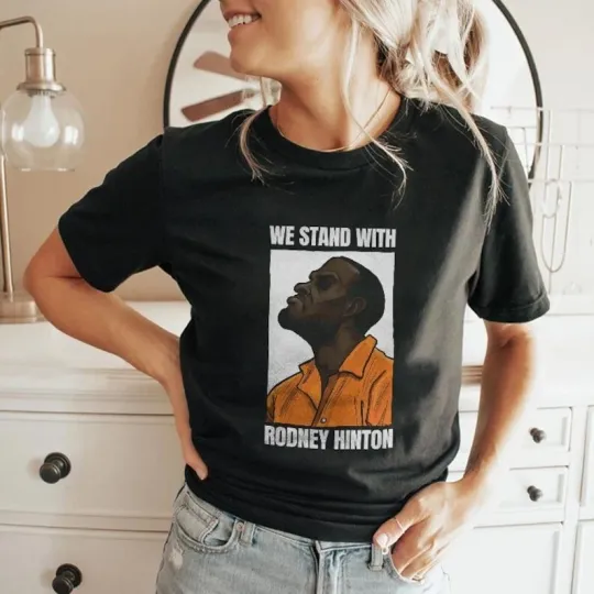 Discover We Stand With Rodney Hinton Unisex Black T-Shirt