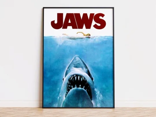 Discover Jaws Poster – Iconic Shark Movie Art with Swimmer and Bold Title