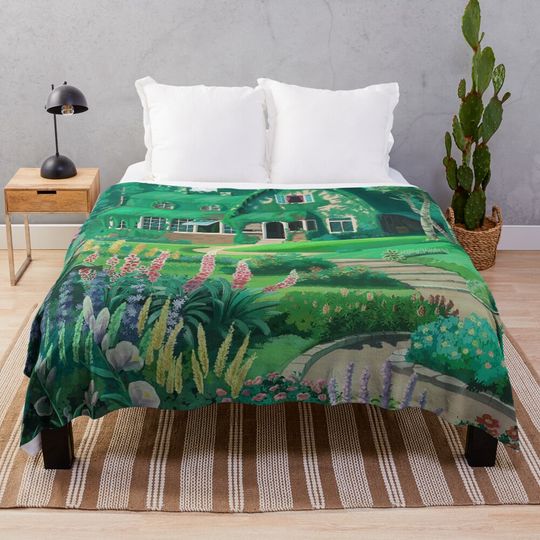 Discover Kiki House Throw Blanket
