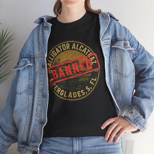 Discover BANNED Alligator Alcatraz Protest T-Shirt | Anti Detention Center Graphic Tee