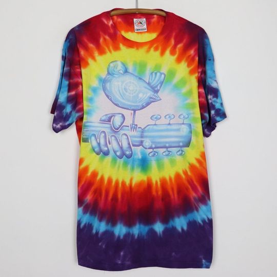 Discover vintage 1994 Woodstock Music Festival Tie Dye Shirt Size: Extra Large