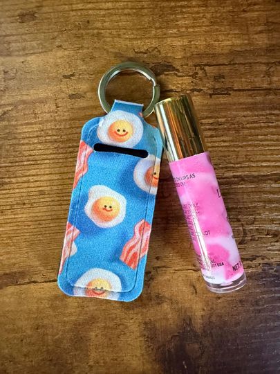 Discover Bacon and eggs lipstick holder. You can attach to keys, keychains