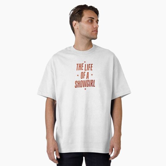 Discover The Life of a Showgirl Orange Glitter Oversized T-Shirt