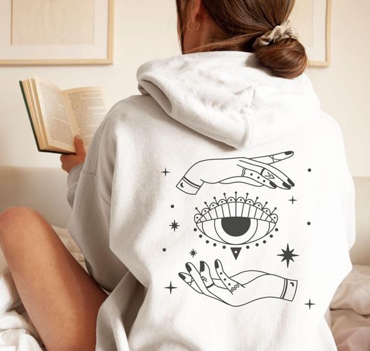 Discover Evil Eye Graphic Hoodie, Trendy and Oversized