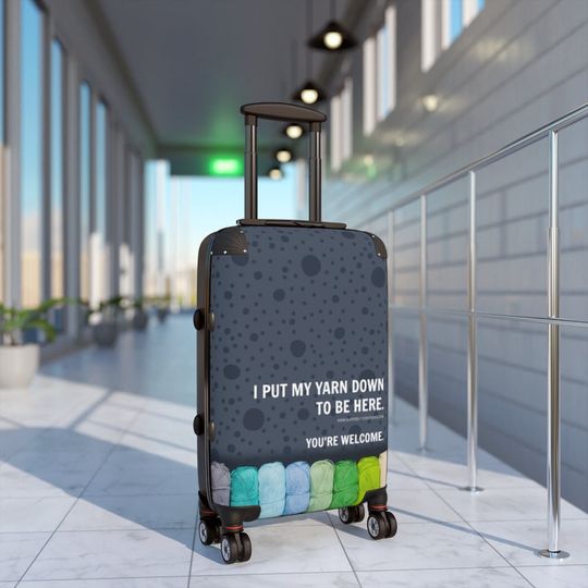 Discover Hard Shelled Carry on Rolling Suitcase