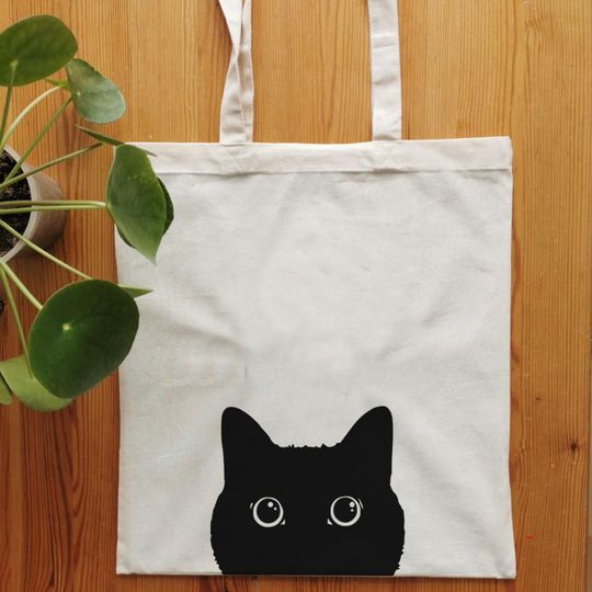 Discover Jute Bag featuring a Black Kitty Design