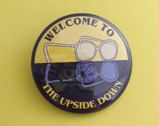 Discover Welcome to the Upside Down Pin Button