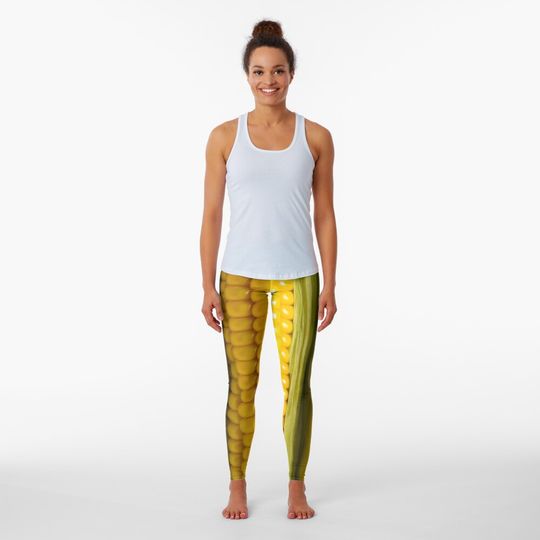 Discover Three corn ears. Vegetable concept background Leggings