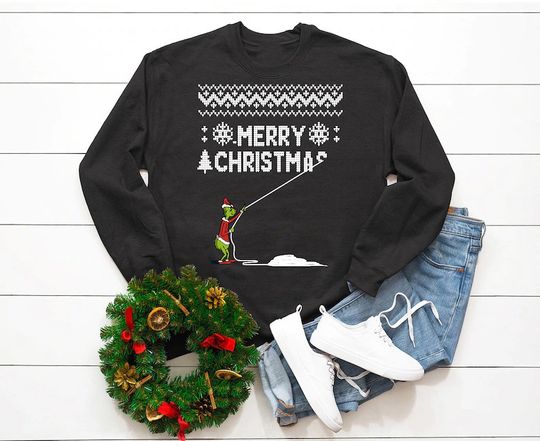 Discover Suéter Sweatshirt Unissexo Grinch Roubando Natal